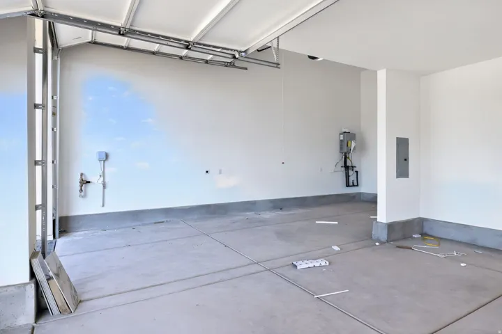 Garage featuring electric panel