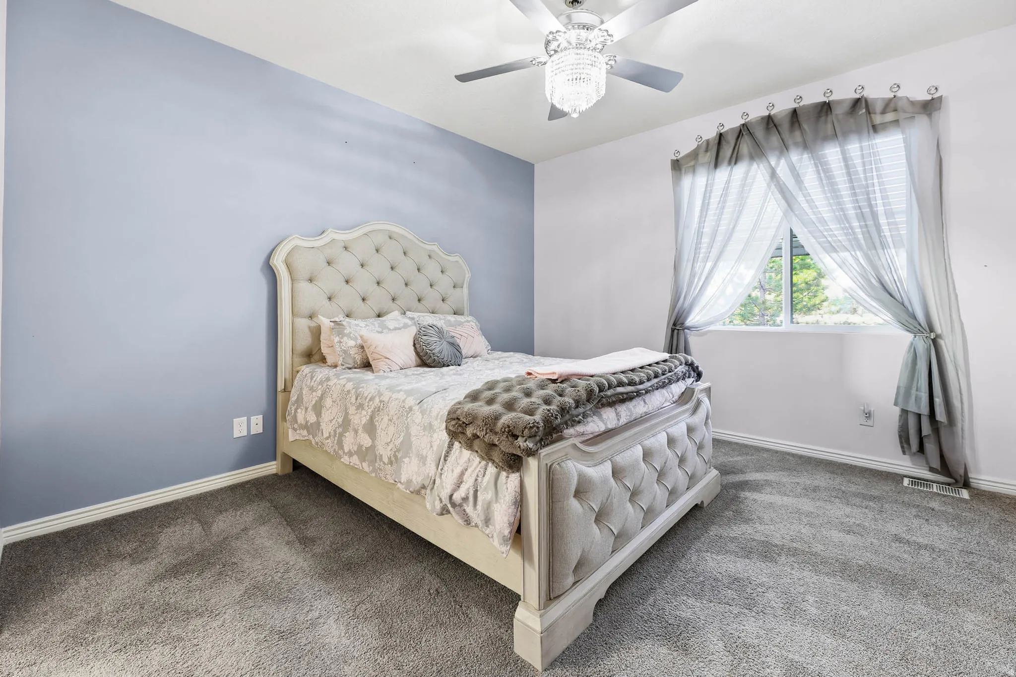 Large primary bedroom with so much space for all your furniture!