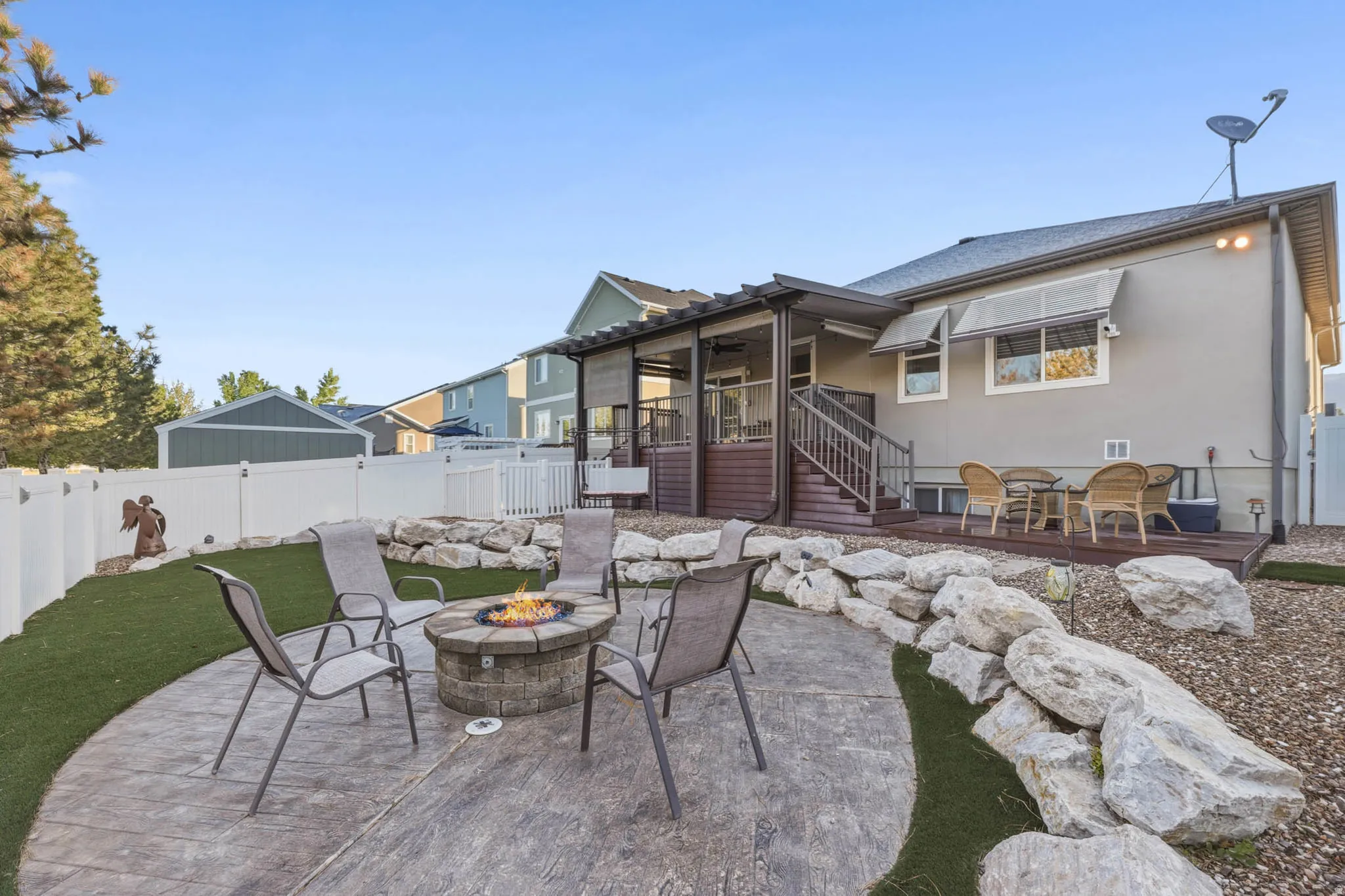 The backyard is easy xeriscaped maintenance! Enjoy the covered deck off of the dining area, lounge in the second deck, or tell your best stories around the fire pit!