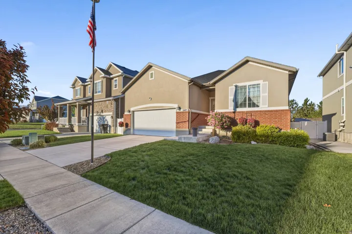 Beautifully landscaped east facing rambler.