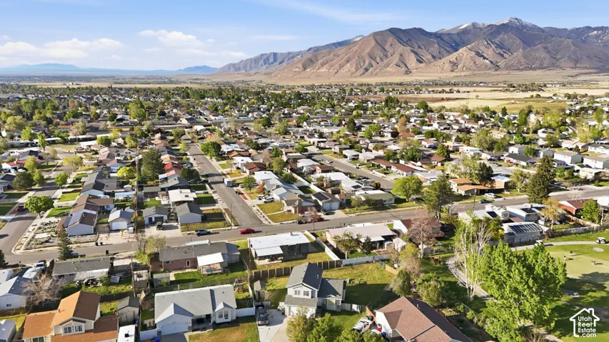 Aerial perspective of suburban area featuring mountains