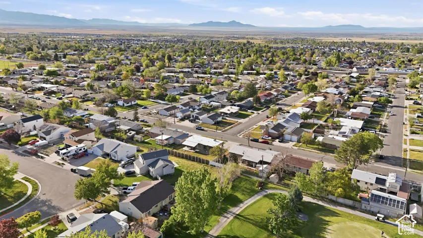Aerial view of residential area with a mountain backdrop