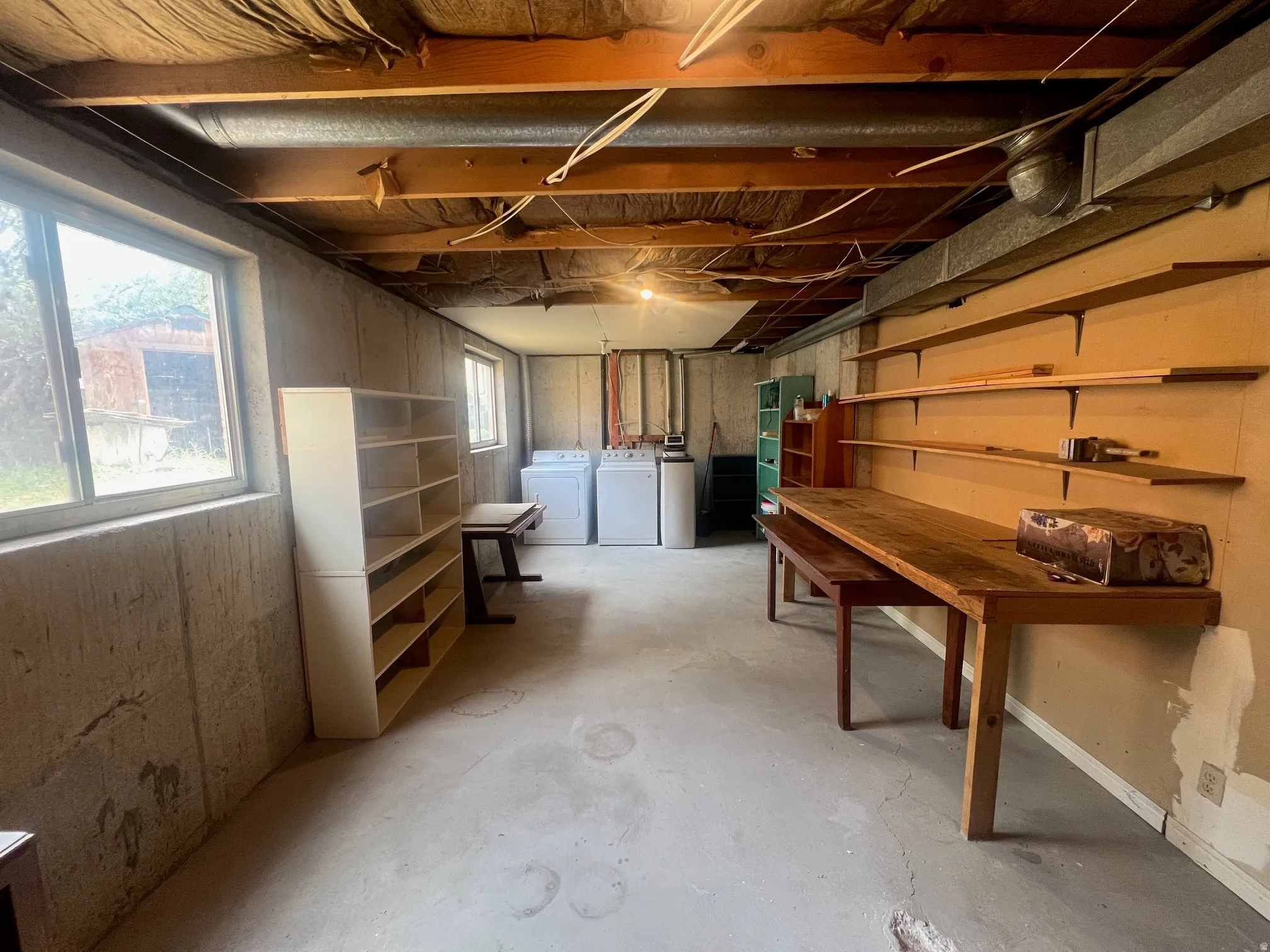 Basement with washing machine and dryer