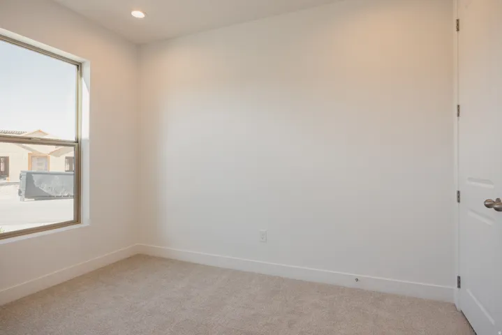 Unfurnished room featuring light colored carpet and recessed lighting