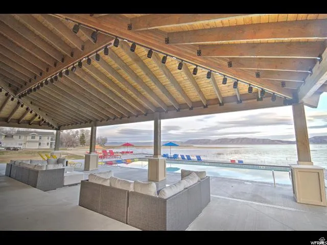 View of patio / terrace featuring a pool and an outdoor living space