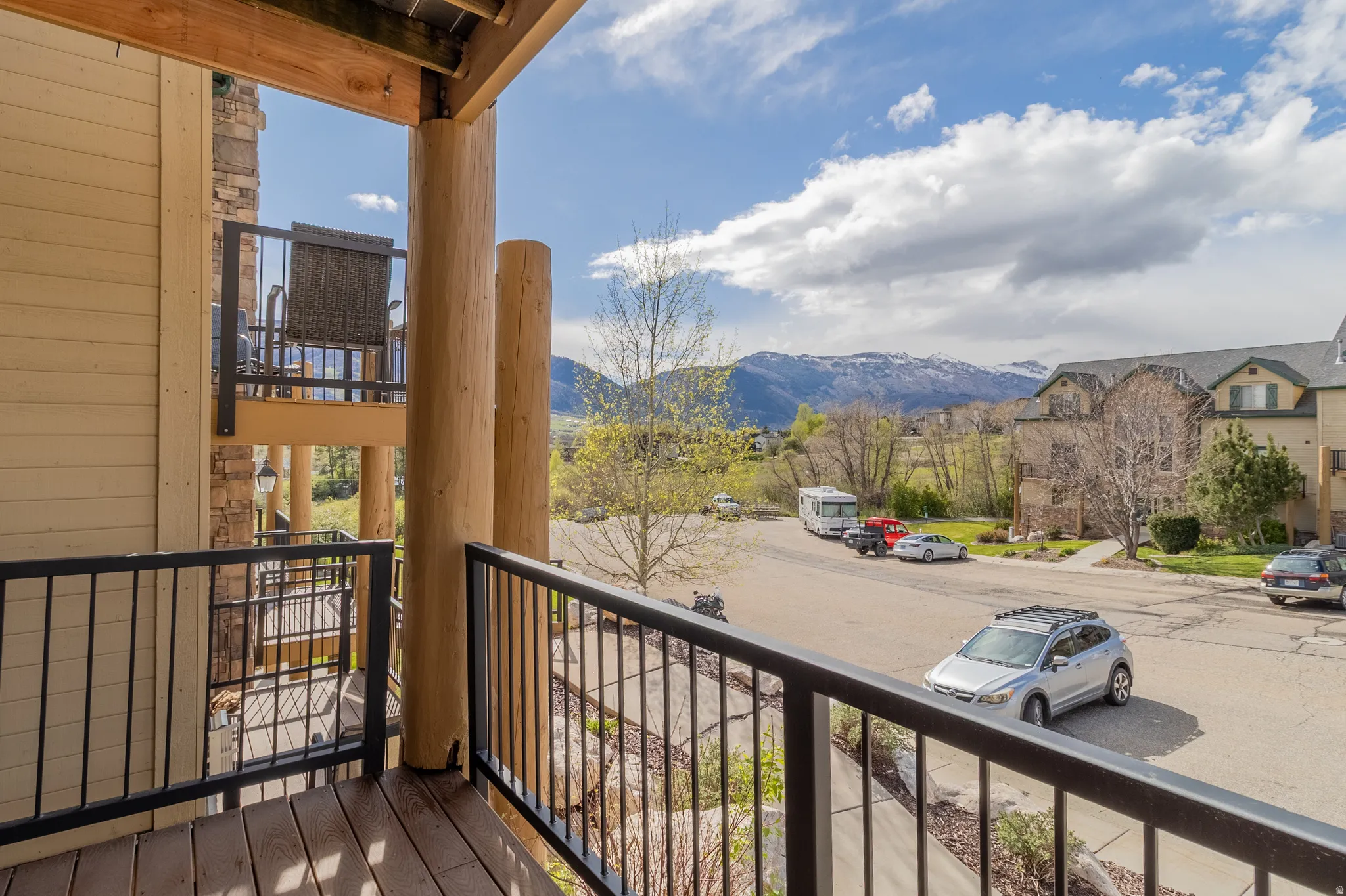 Balcony with a mountain view and a residential view