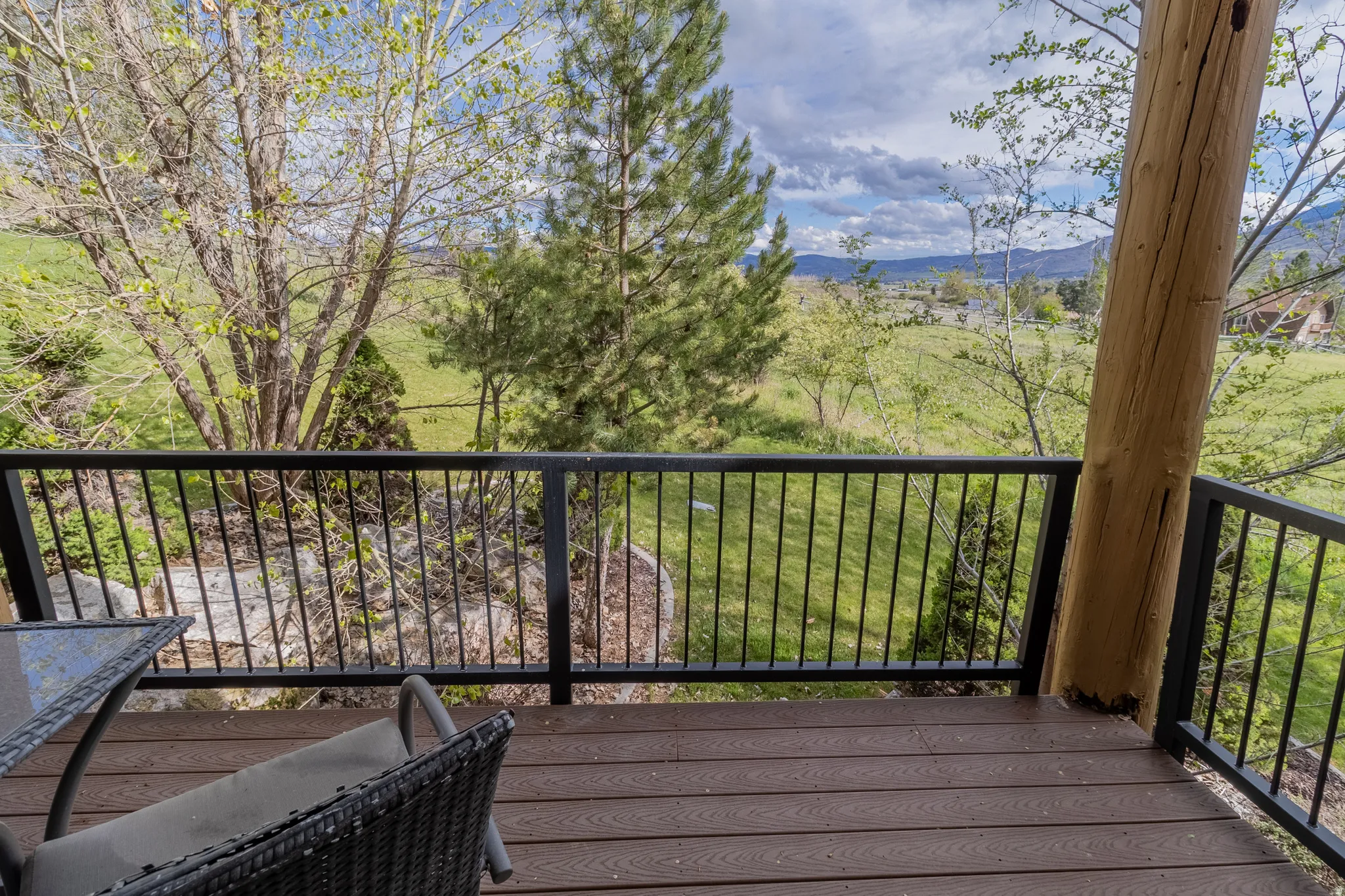 Wooden deck featuring a mountain view