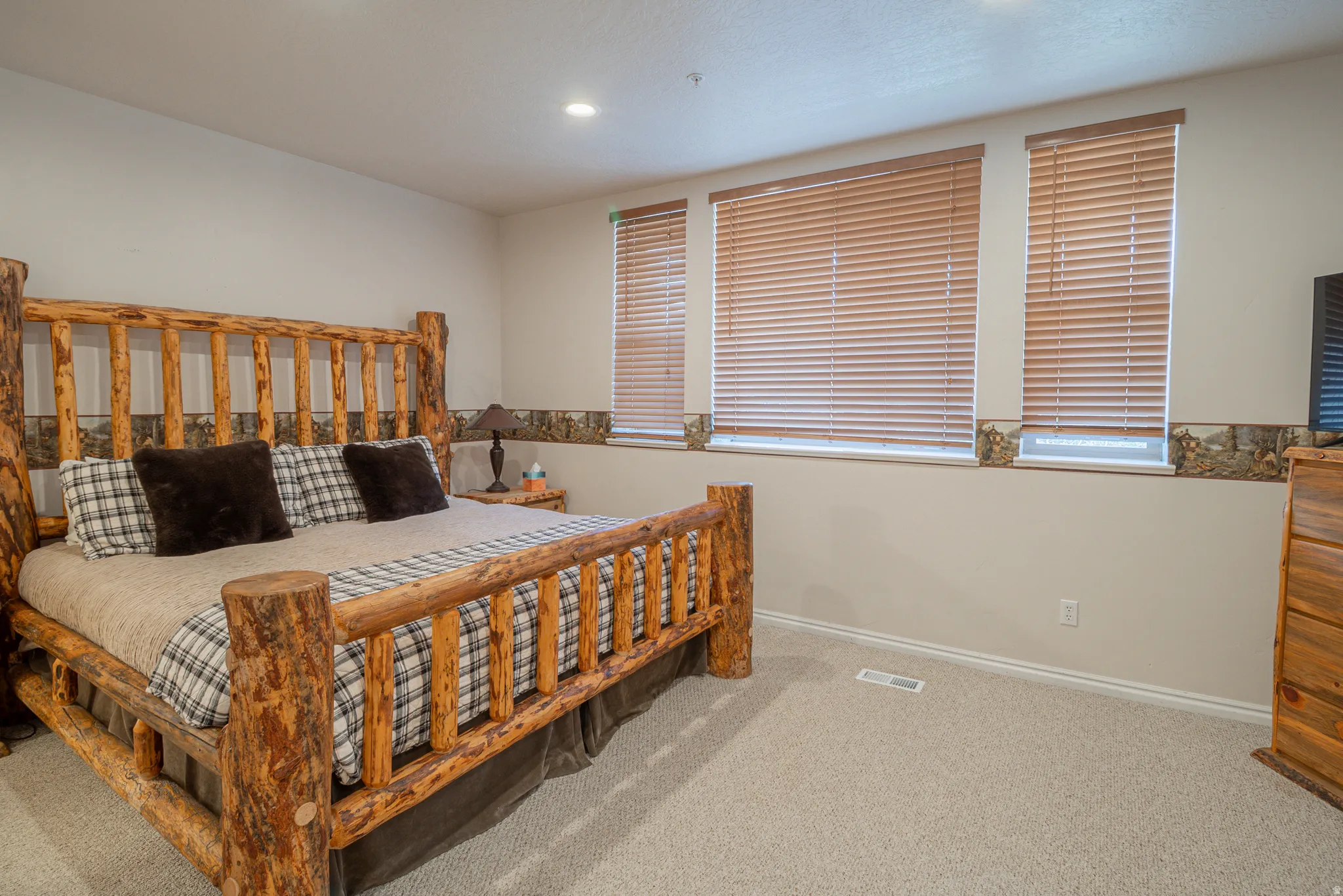 Bedroom with carpet flooring and recessed lighting