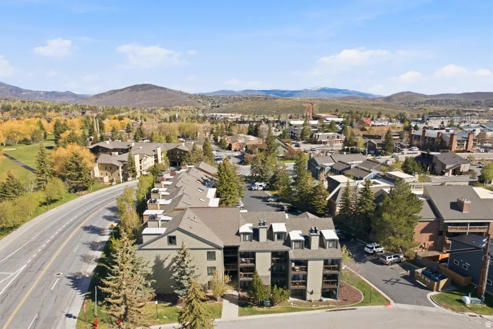 Aerial perspective of suburban area with mountains