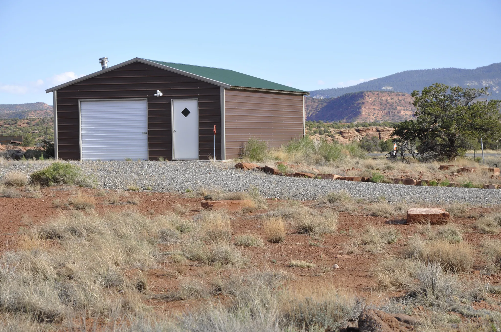 Detached garage with a mountain view