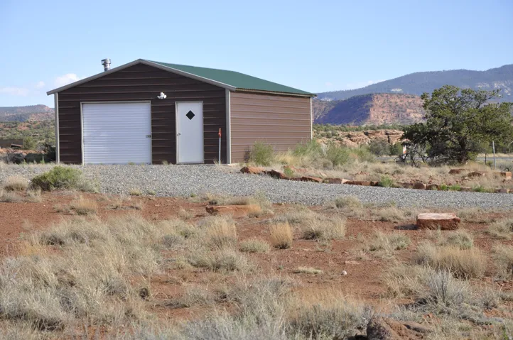 Detached garage with a mountain view