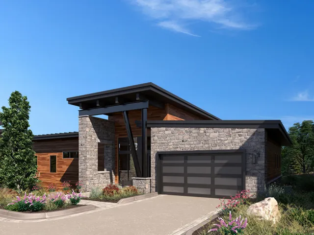 Modern home featuring stone siding, an attached garage, and concrete driveway