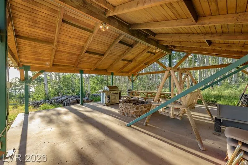 View of patio featuring an outdoor kitchen