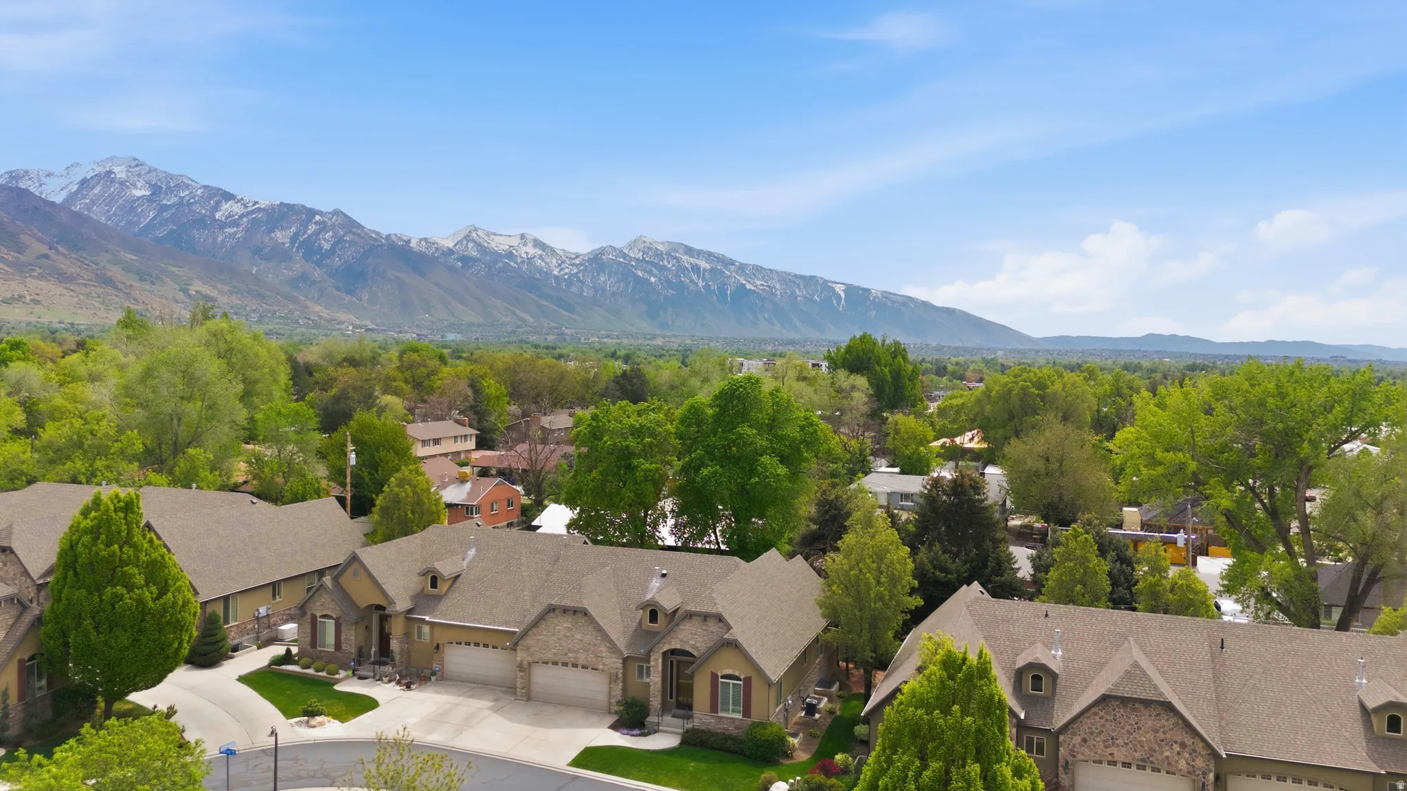 Aerial view of residential area with mountains