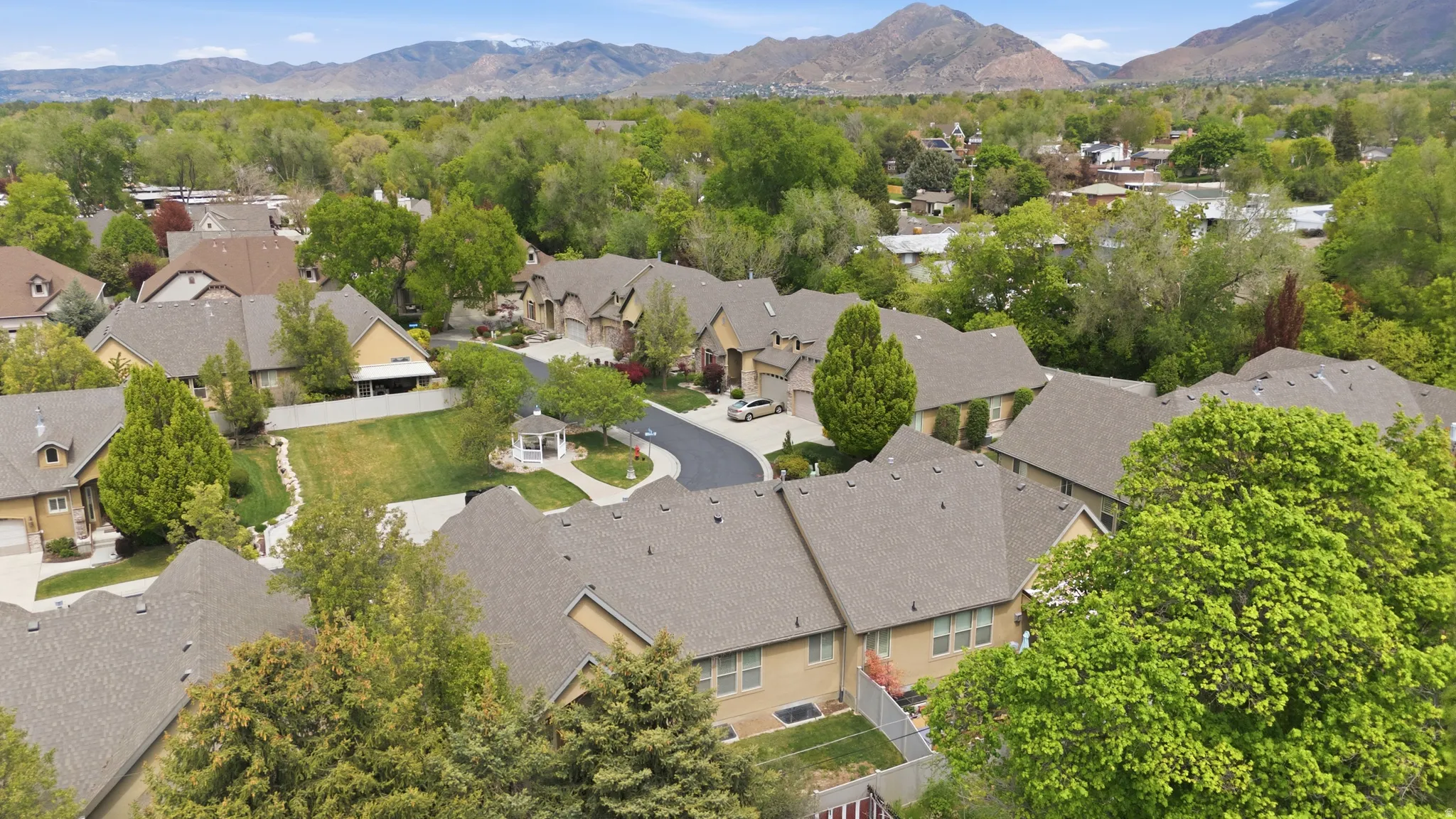 Aerial view of residential area with mountains