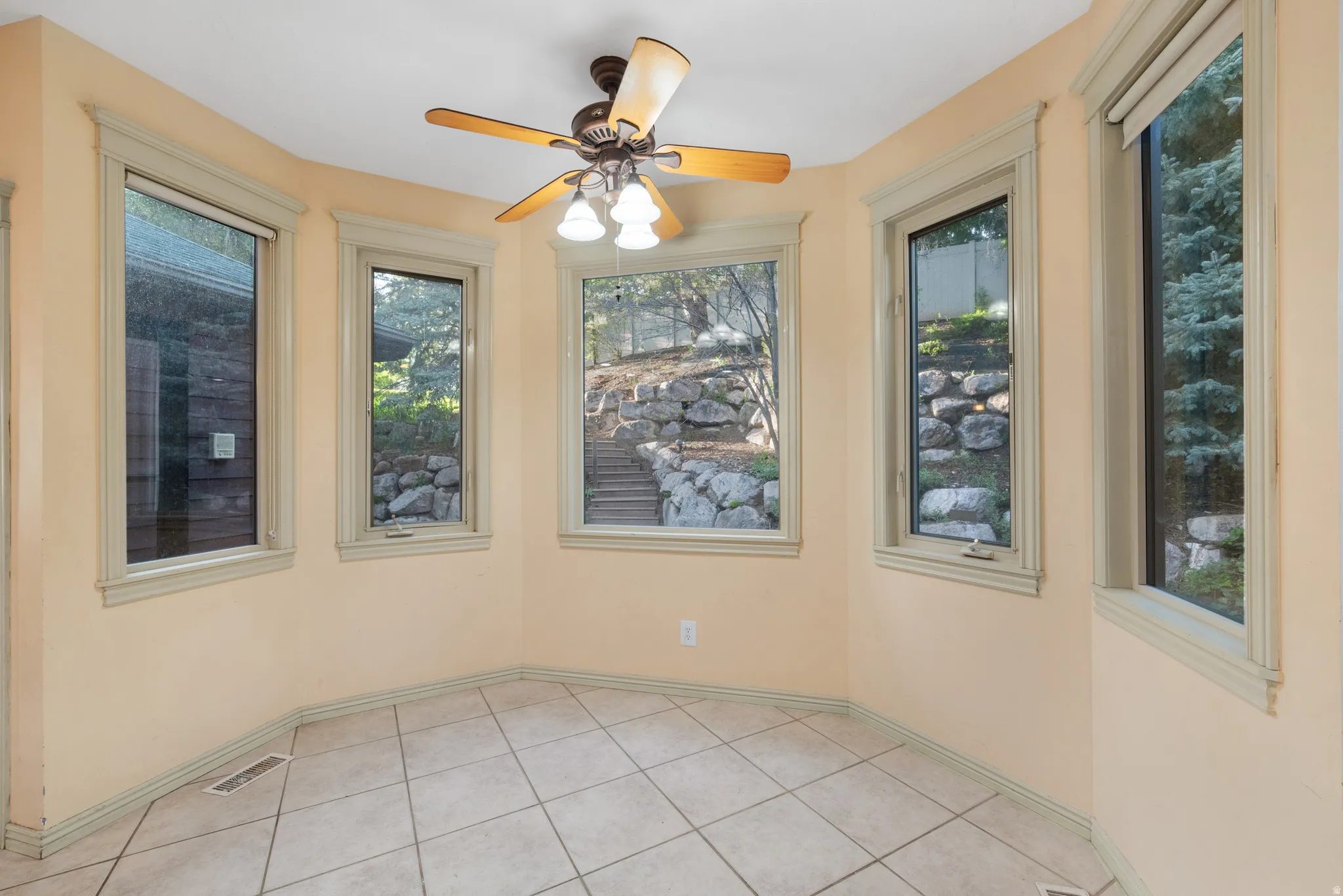 Dining area surrounded by windows