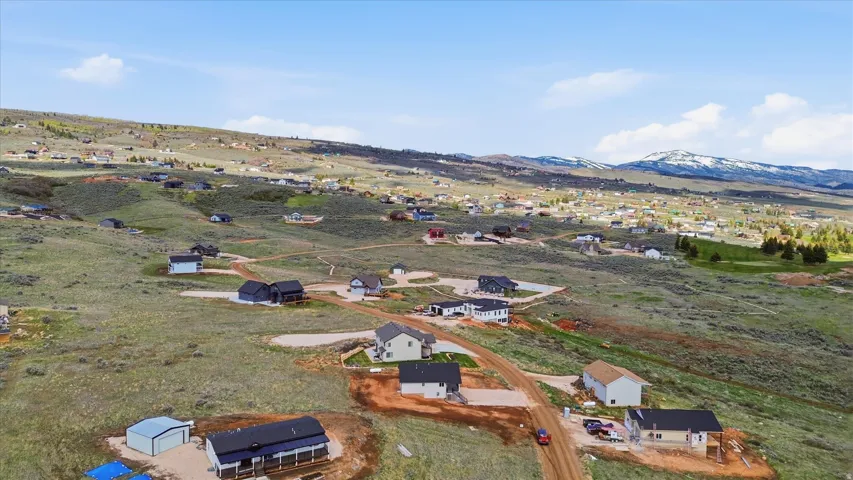 Aerial perspective of suburban area with mountains