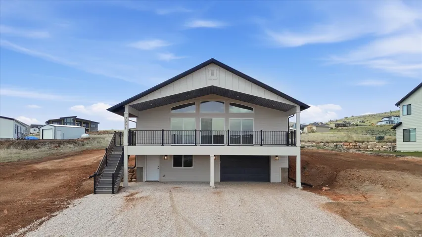 View of front of house featuring driveway and a garage
