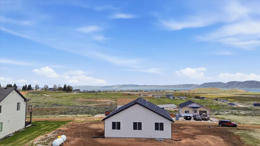 View of side of property featuring a mountain view