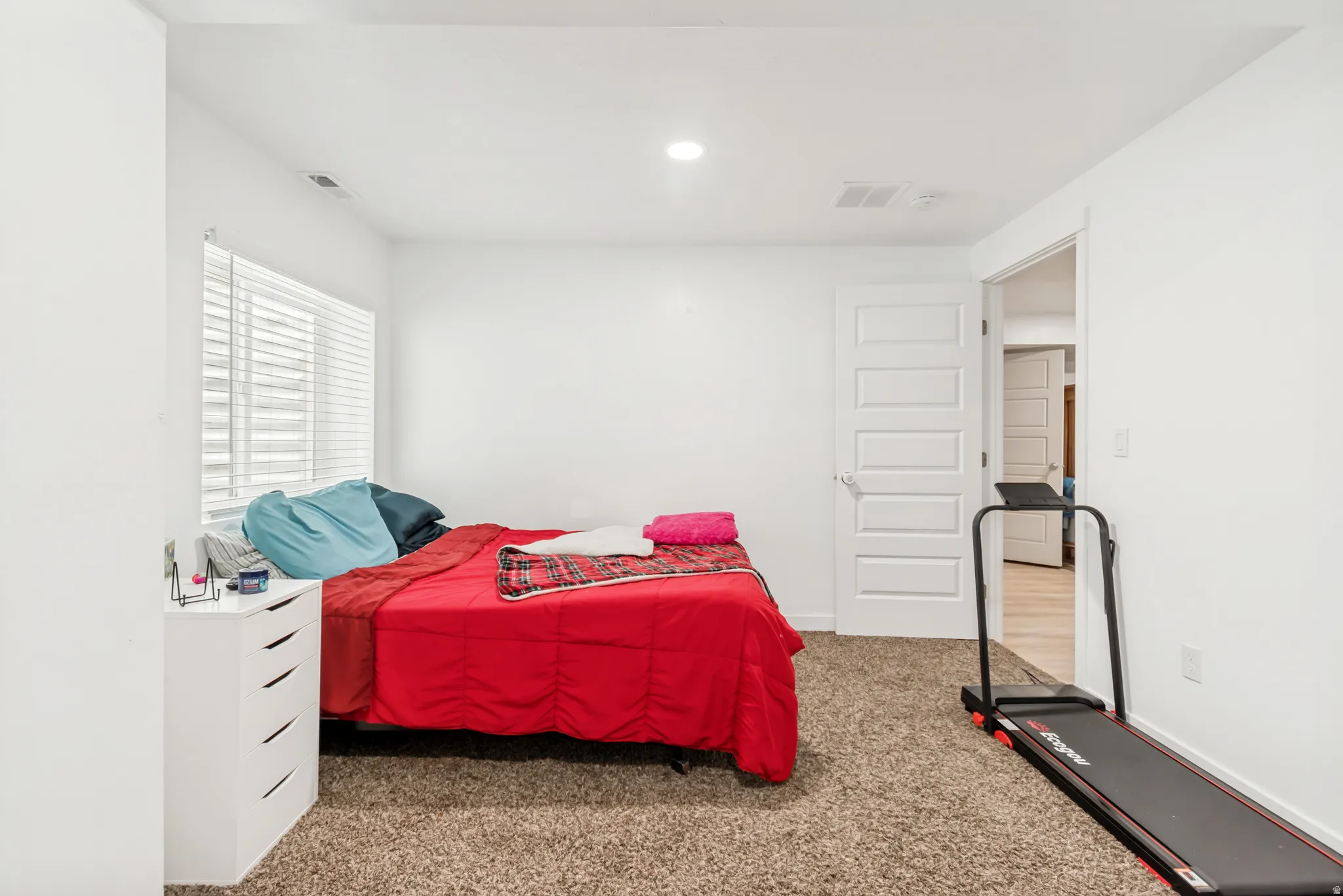 Bedroom with carpet and recessed lighting