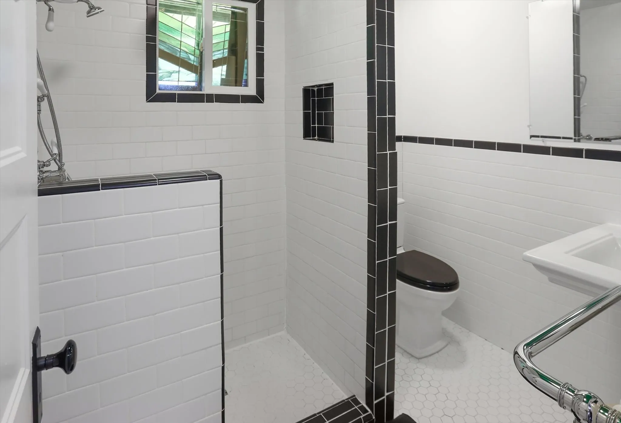 Full bathroom featuring tile walls and walk in shower