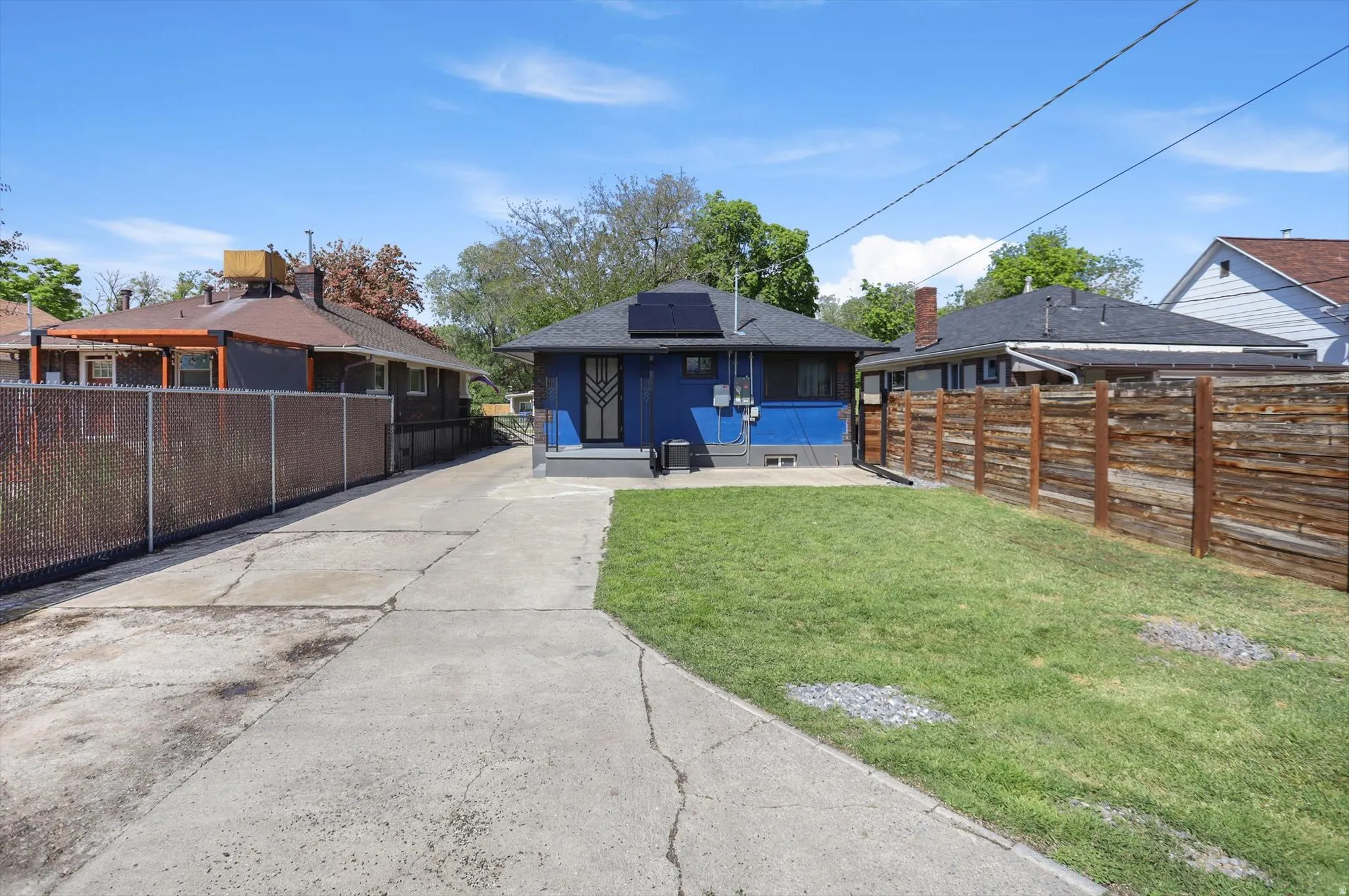 Back of property with roof mounted solar panels
