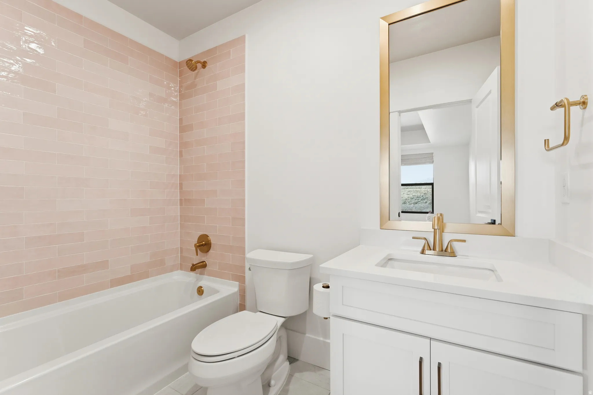 Full bathroom with vanity, bathing tub / shower combination, and light tile patterned flooring