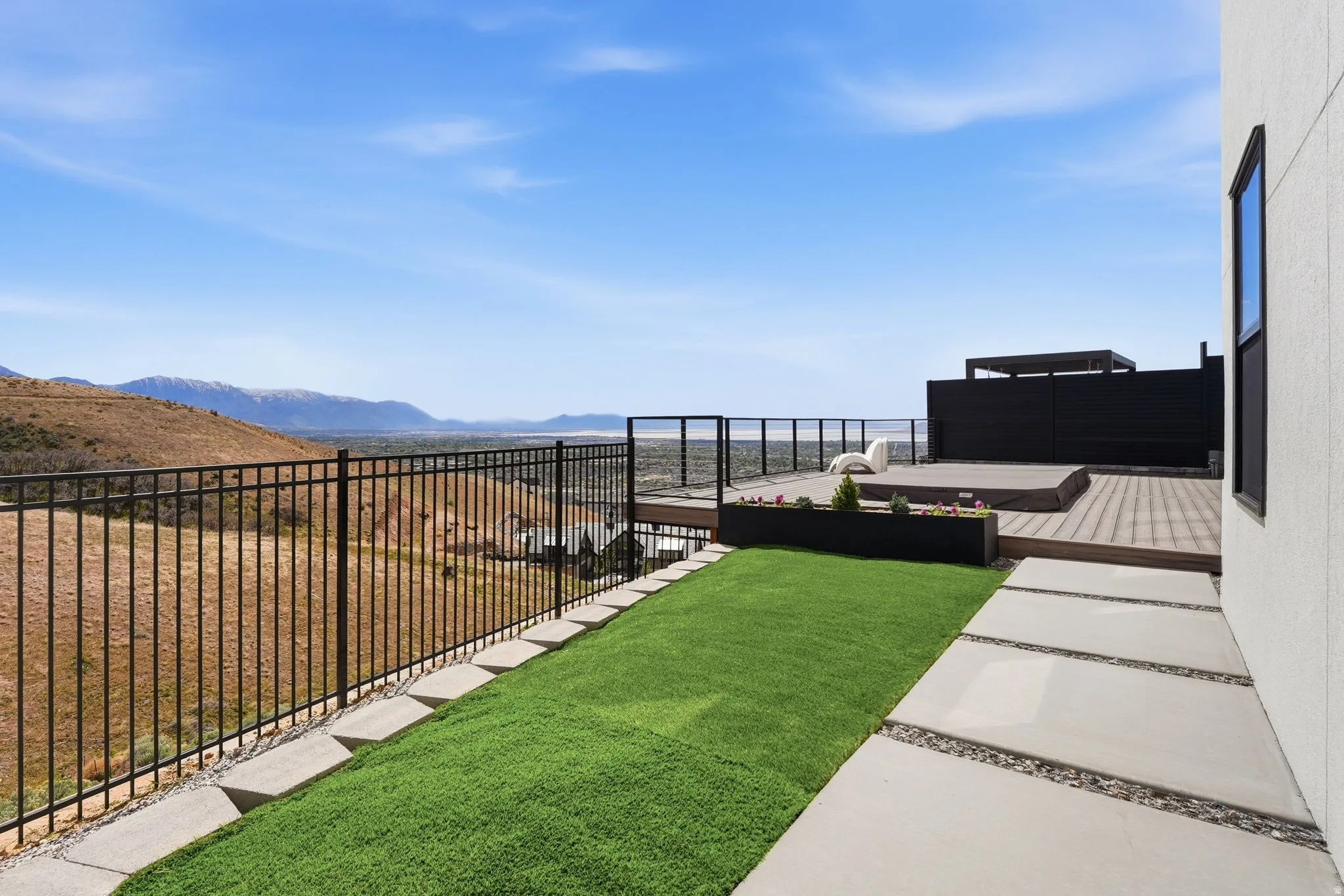 View of yard with a patio and a mountain view