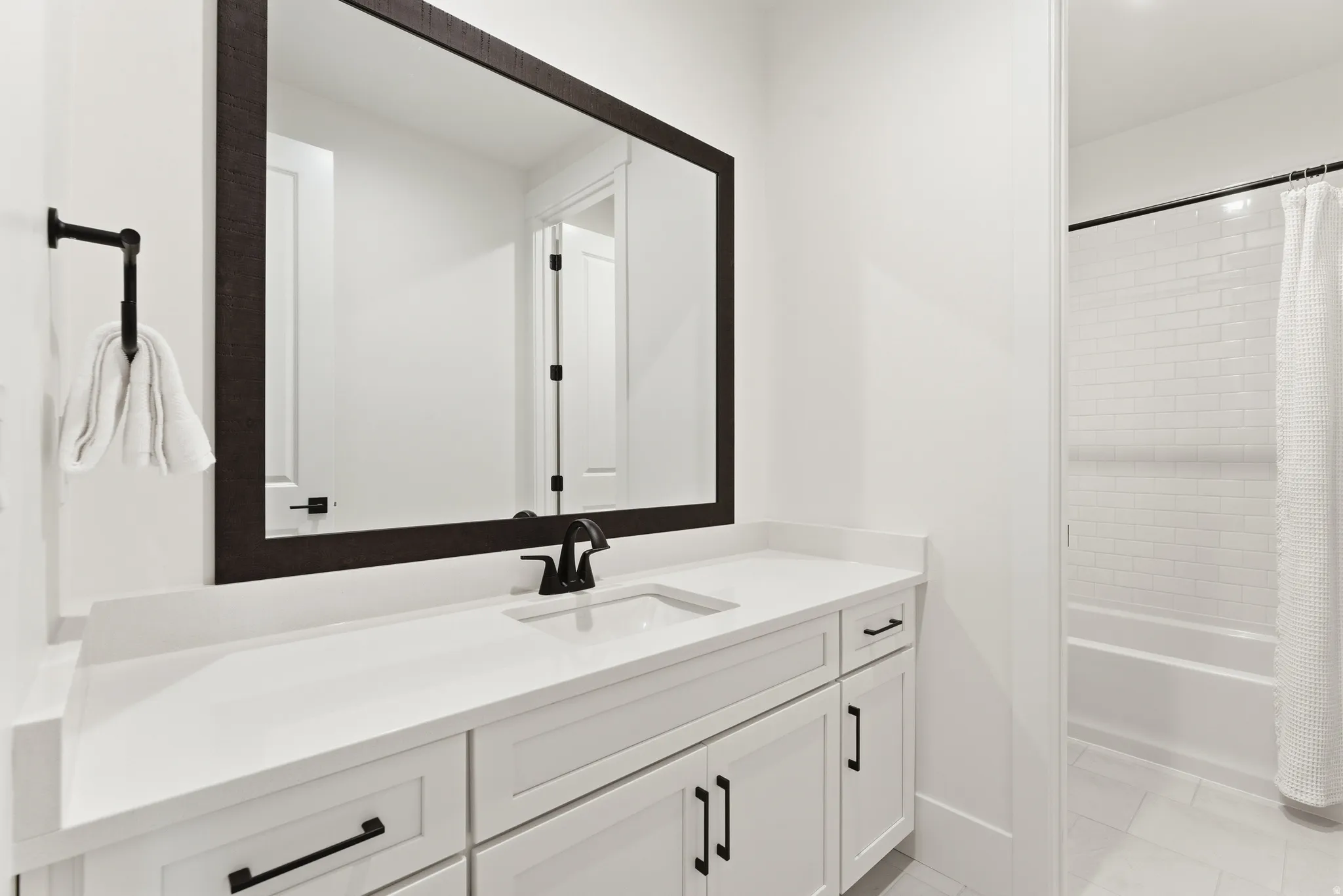 Full bathroom featuring vanity and shower / bath combo
