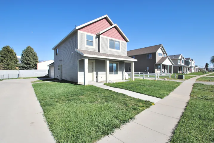 View of front facade featuring covered porch