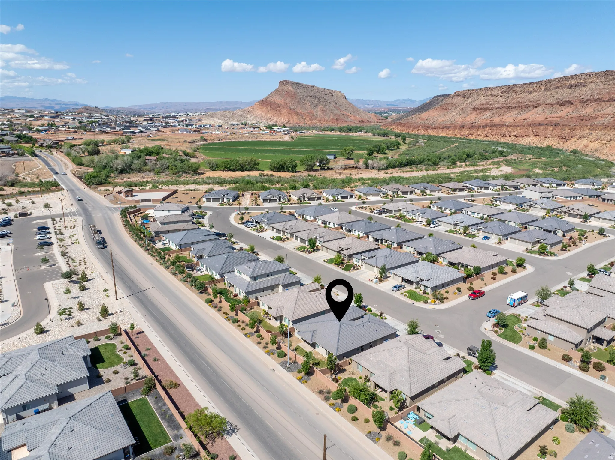 Aerial perspective of suburban area featuring mountains