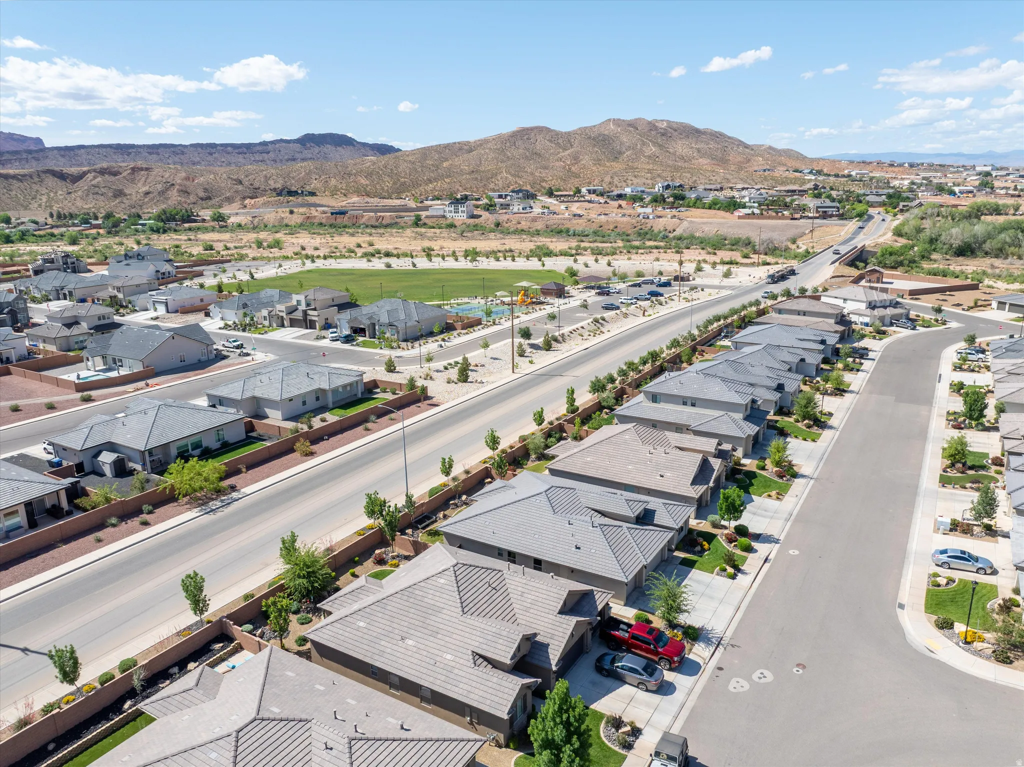 Aerial perspective of suburban area featuring mountains