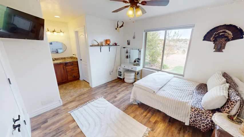 Bedroom featuring Vanity and Access to Jack and Jill Bathroom