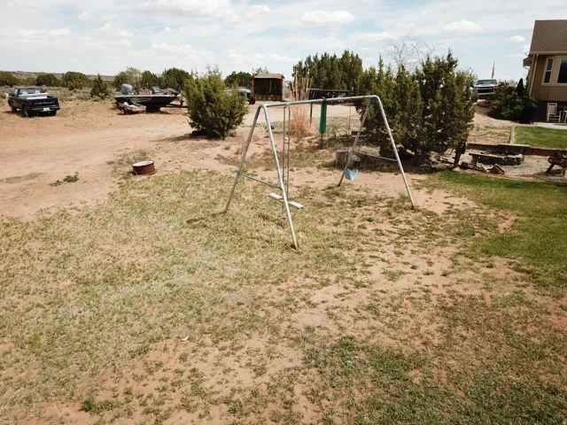 View of yard with a playground