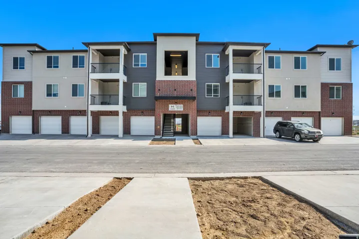 View of property with a garage