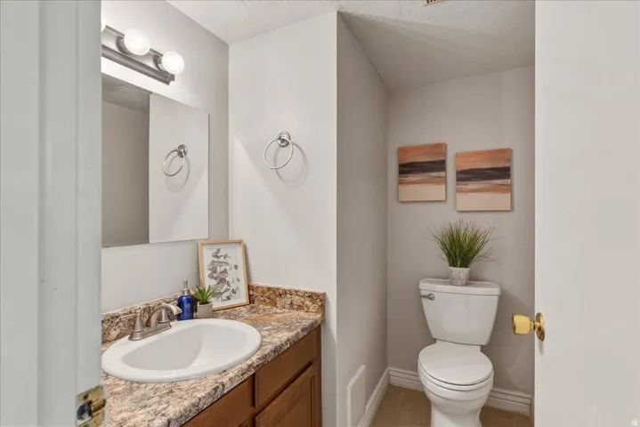 Bathroom with vanity and toilet