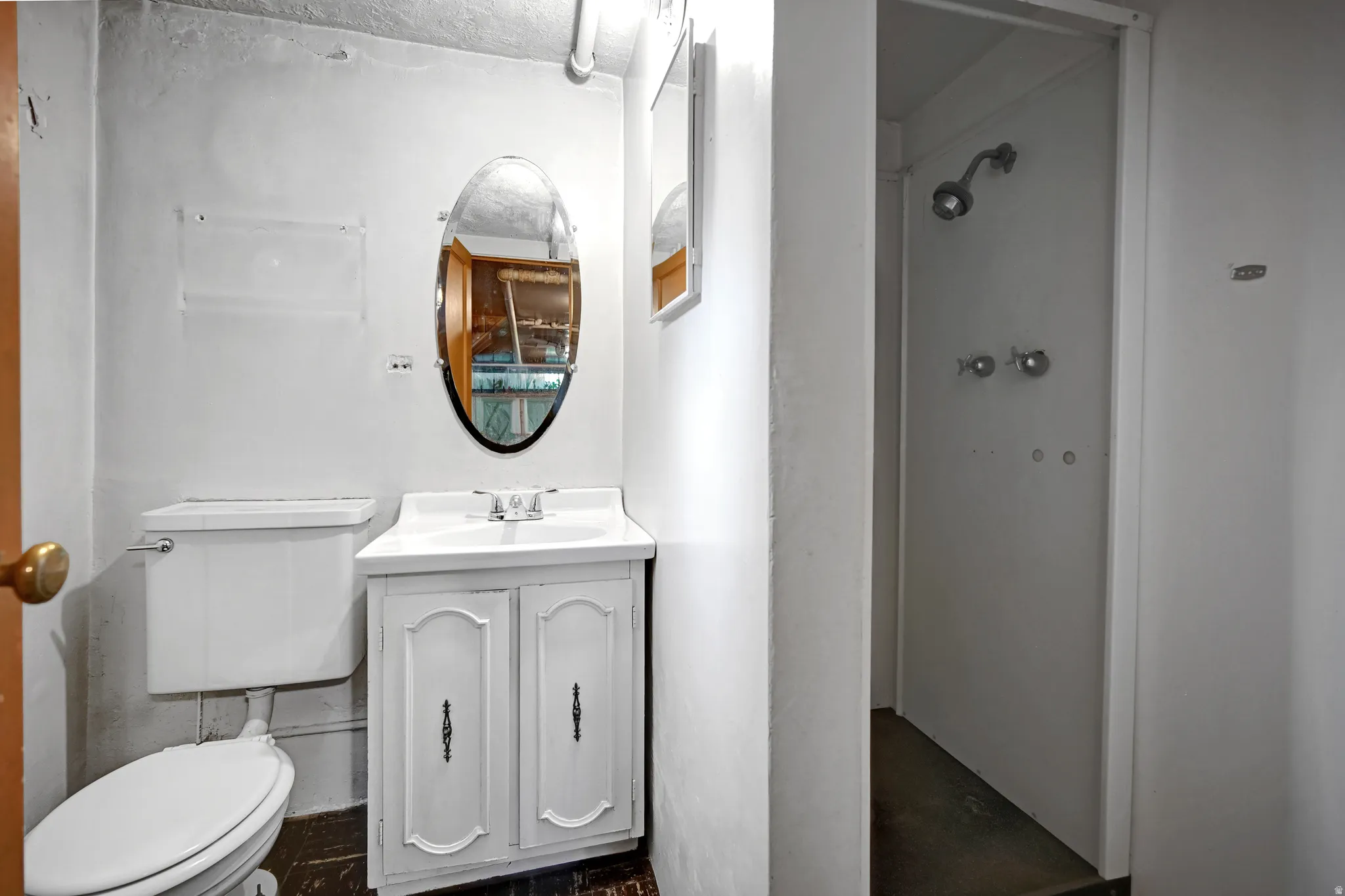 Bathroom with vanity and a stall shower