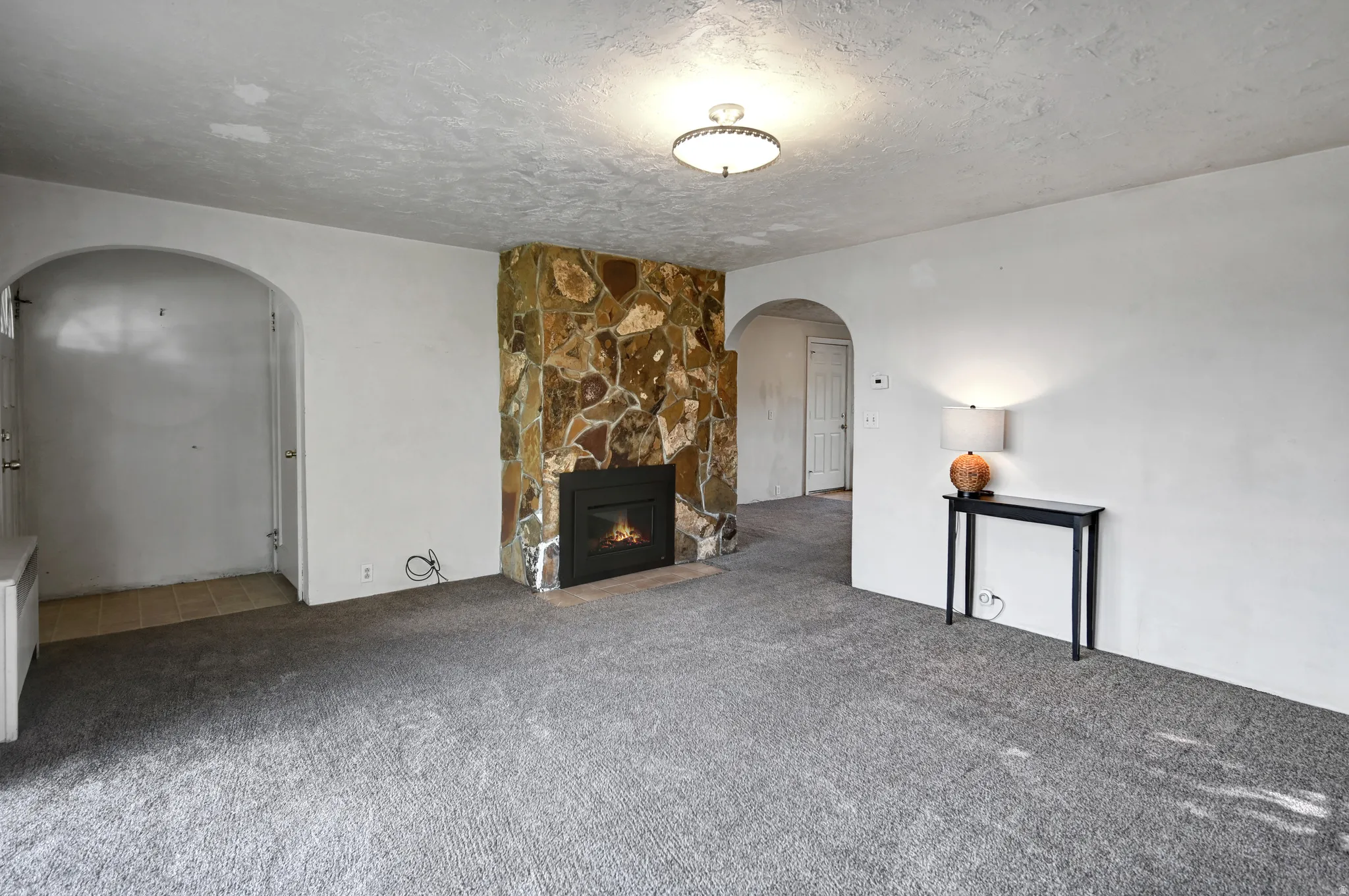 Features a gas fireplace insert