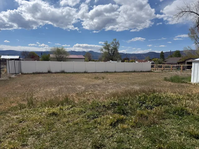 View of yard with a mountain view