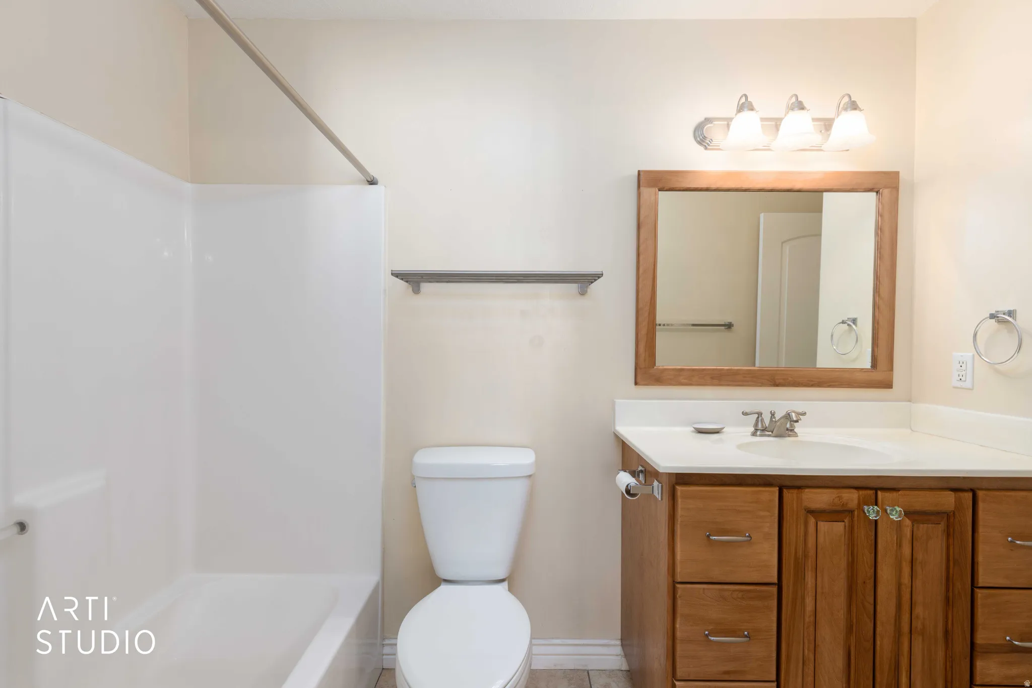 Full bath with vanity and bathtub / shower combination