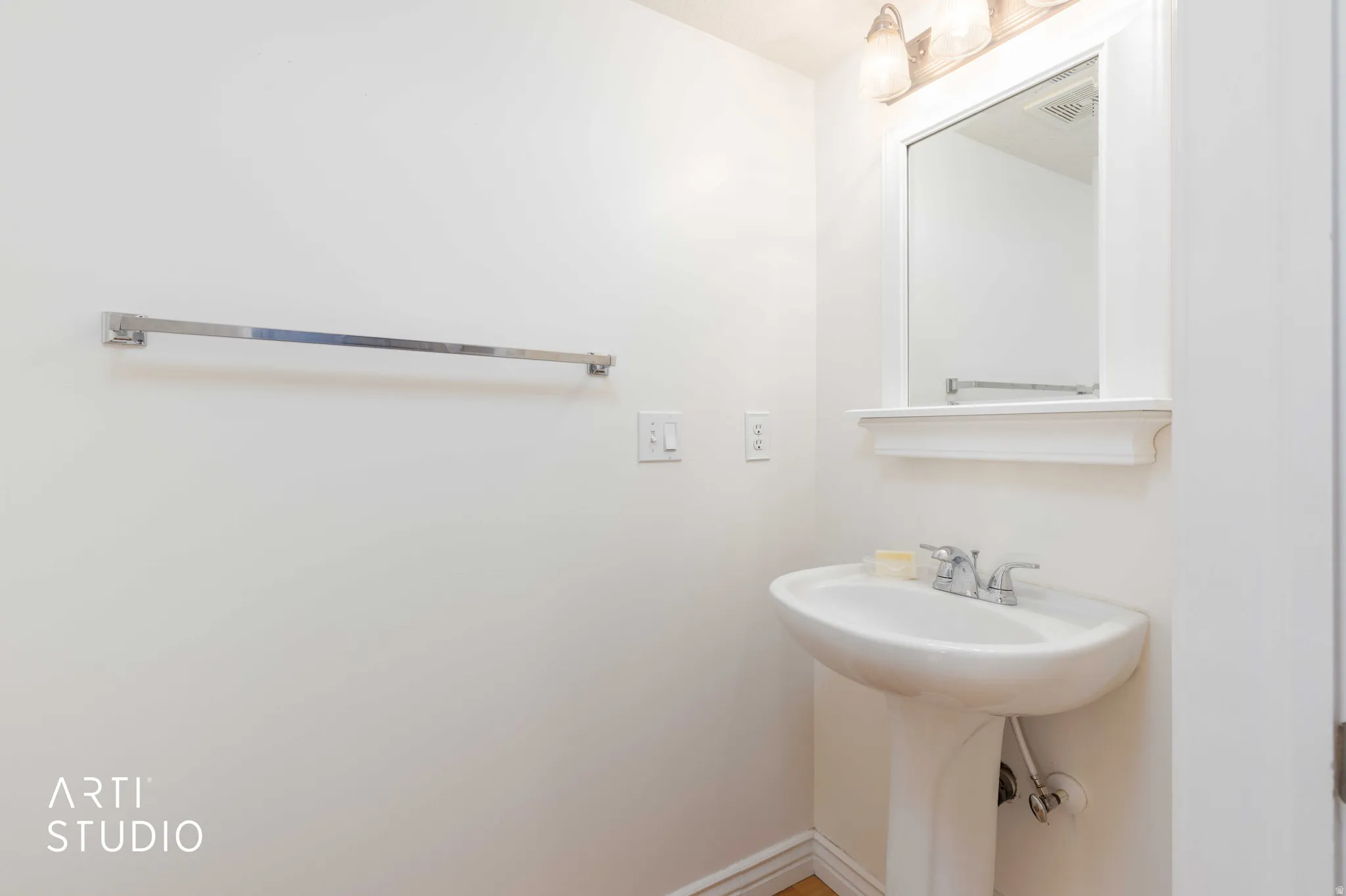 Bathroom featuring baseboards
