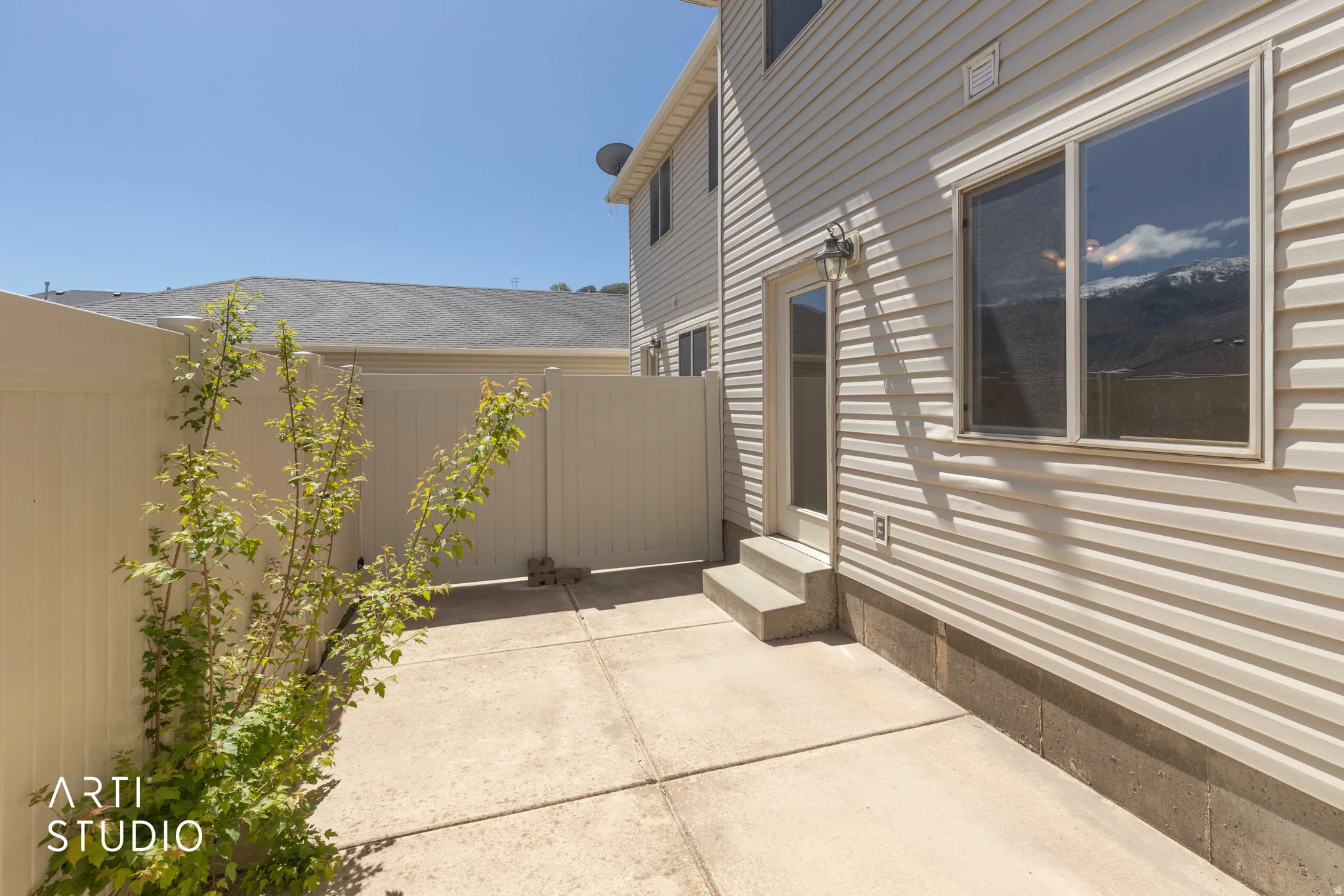 View of property exterior featuring entry steps