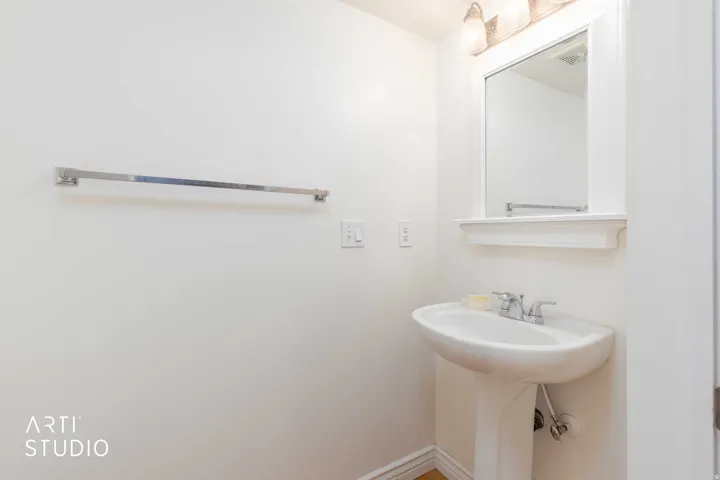 Bathroom featuring baseboards