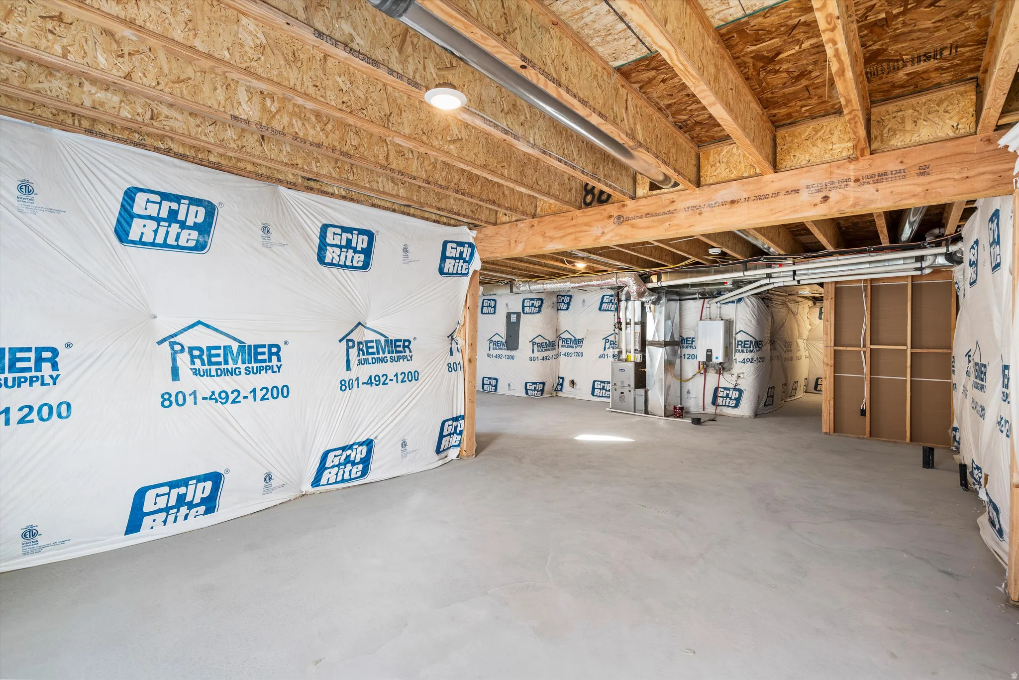 Unfinished basement with heating unit