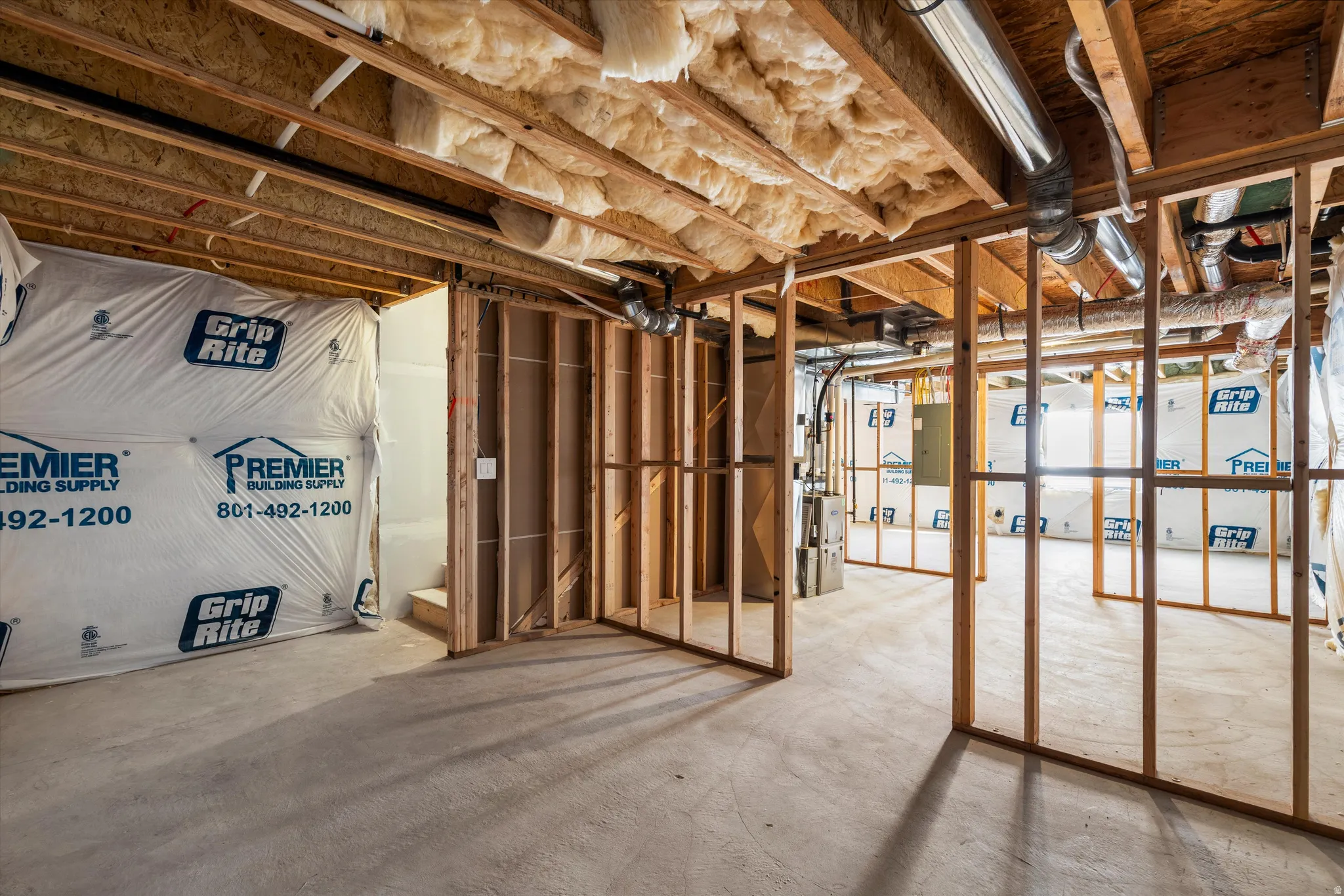 Unfinished basement with heating unit