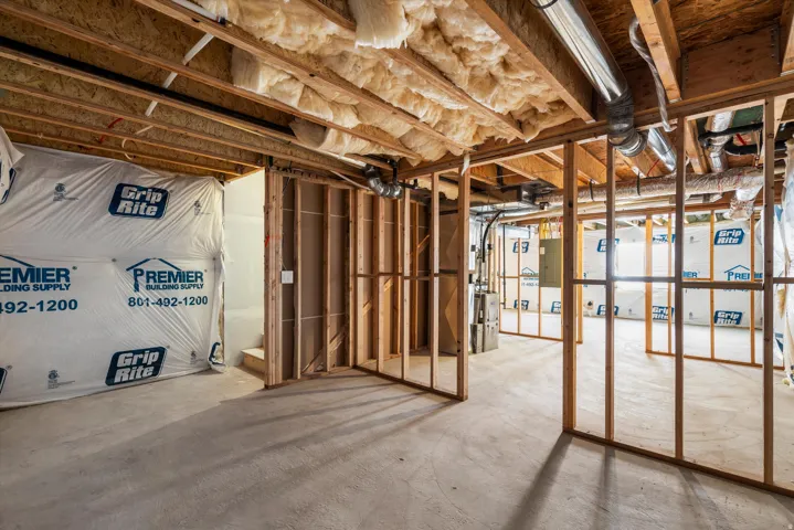 Unfinished basement with heating unit