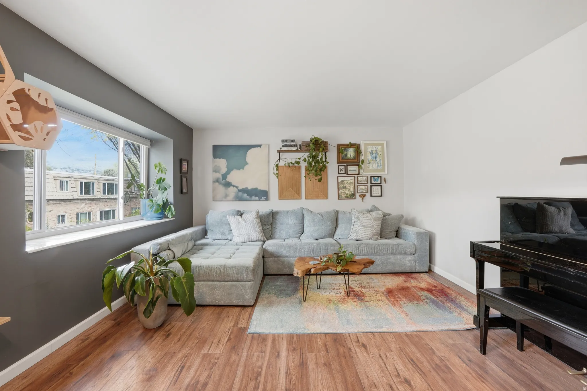 Living room featuring light wood-style flooring