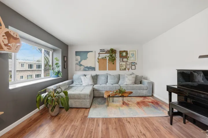 Living room featuring light wood-style flooring