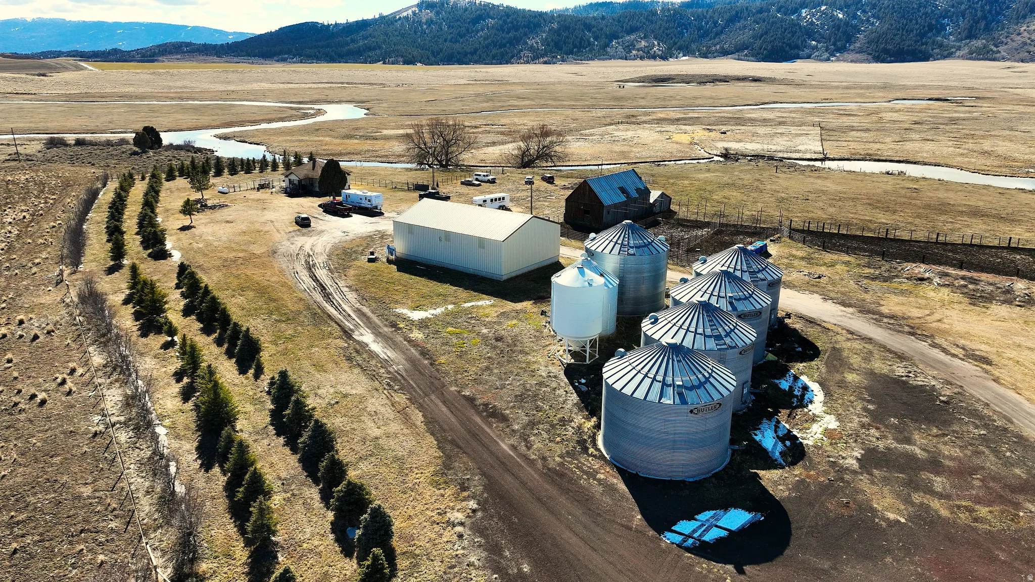 Overview of rural landscape with a mountain backdrop