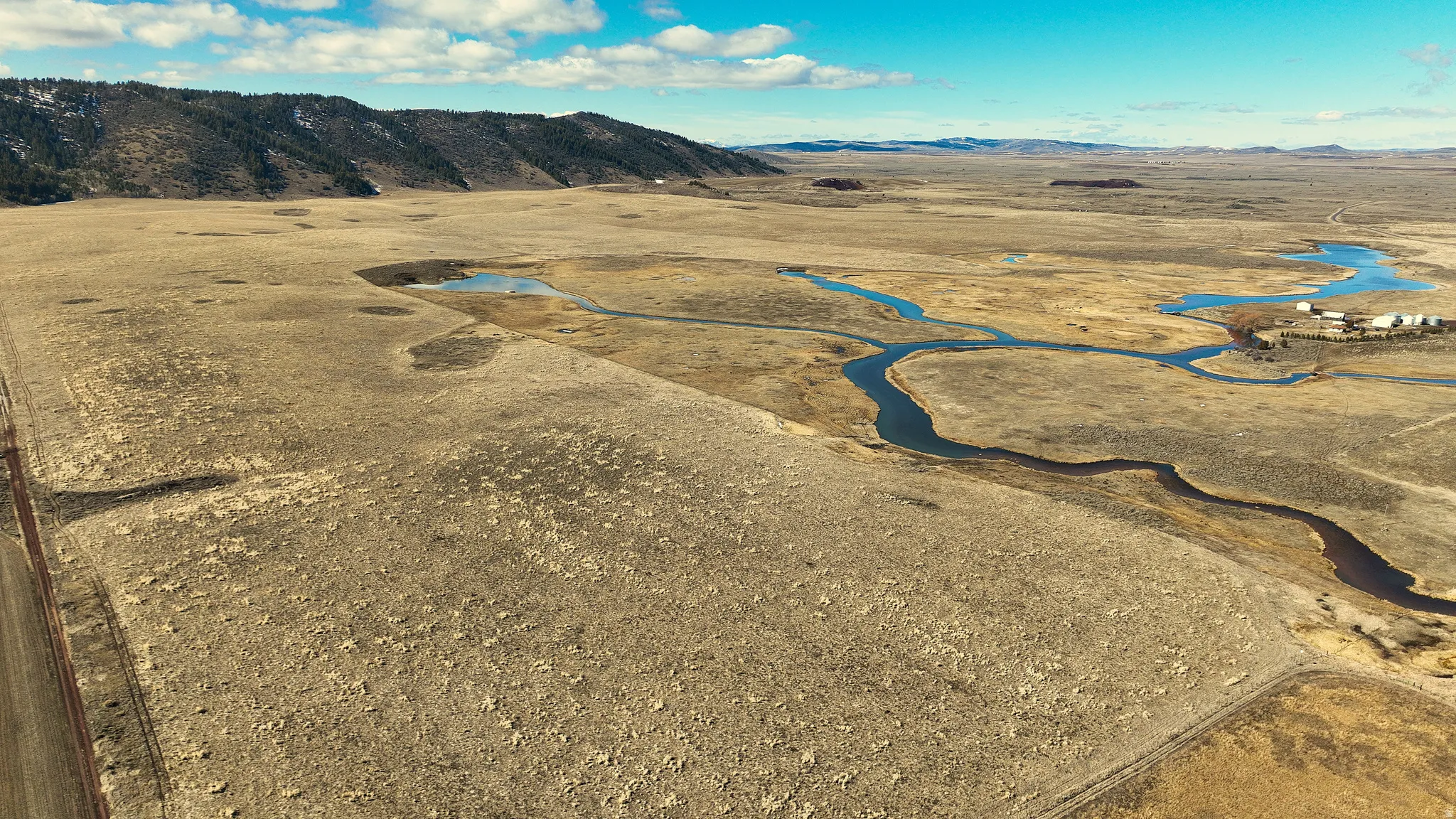 View of rural area with mountains and a desert landscape